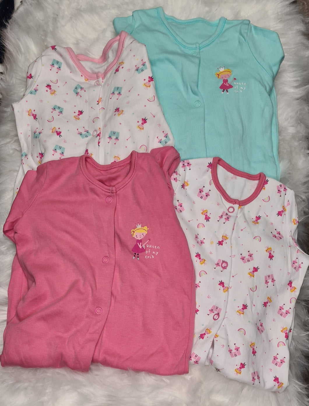 Girls 6-9 months - Pack of 4 Baby Grows